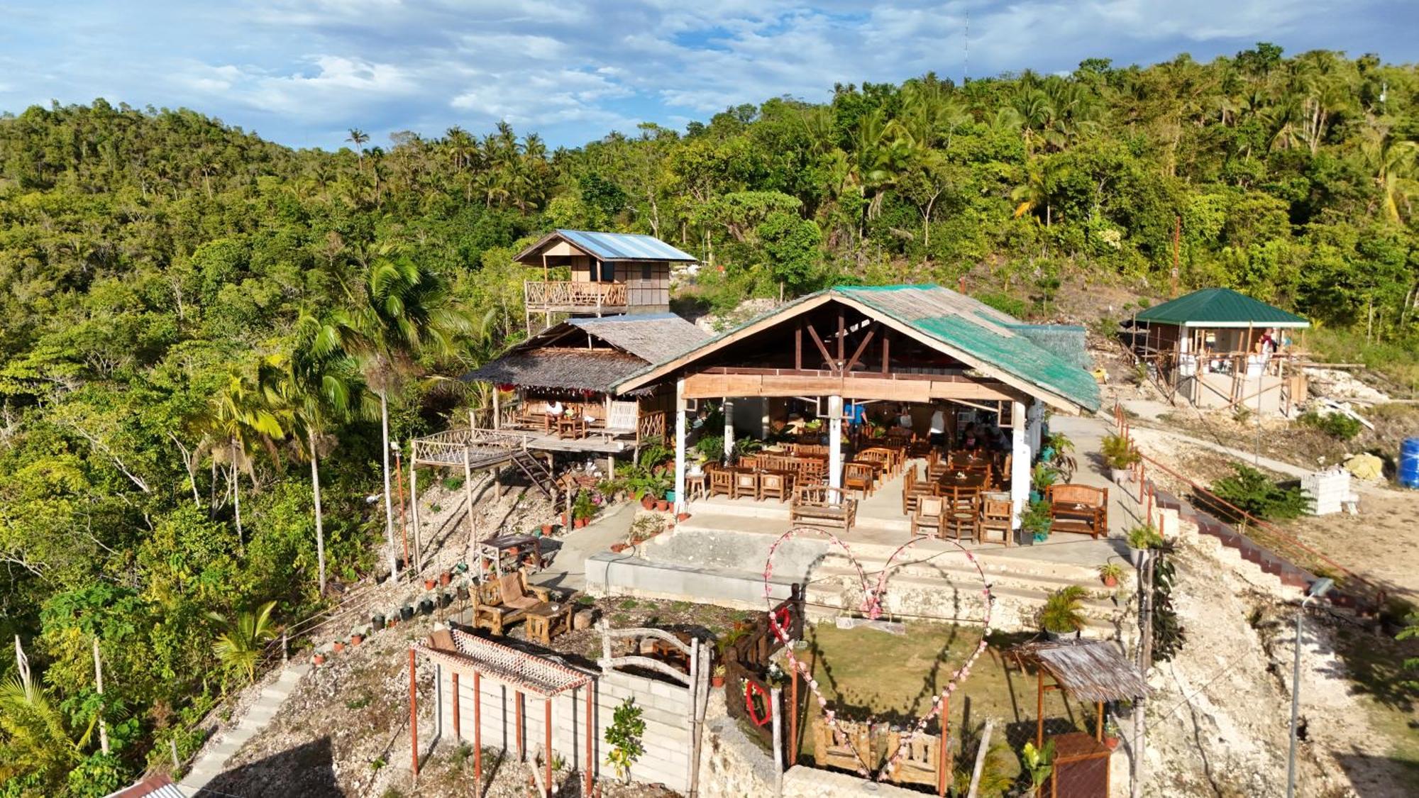 Thornton'S Sea View Cafe & Guesthouse Siquijor Bagian luar foto